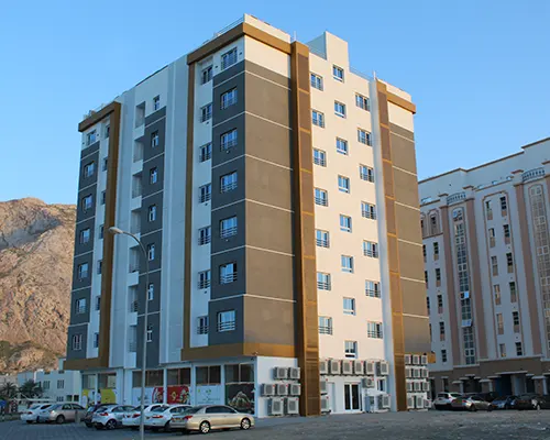 بناية سكنية تجارية – قطعة رقم 1101 في ولاية بوشر